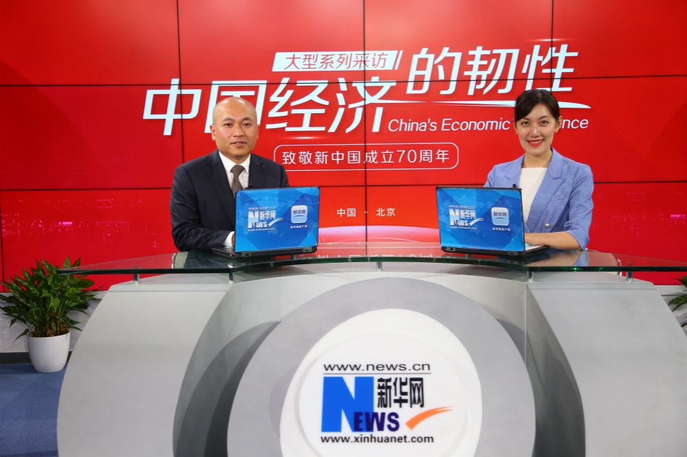 金辉集团执行总裁陈朝荣做客新华网